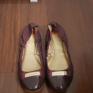 Red sparkling Coach flats